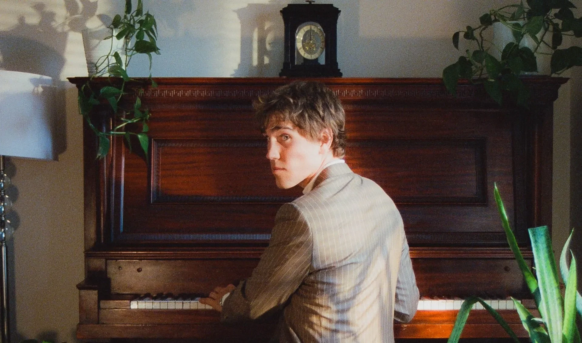 Michael Zuzek playing music on a piano